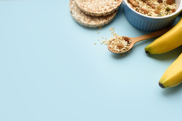 Useful breakfast, proper nutrition, oatmeal, dried fruits, breads, fruits, a centimeter on a light background. Diet. A place for text.