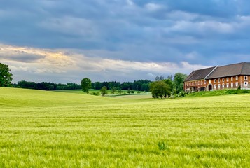 rural landscape with a barn in the background