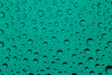 Drops background. Wet water on glass. Rain pattern texture.