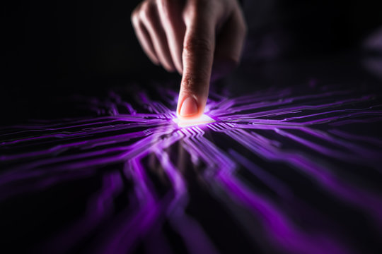 Cyber Security Hacking Concept: Human Finger Pushes Touch Screen Button and Creates Computer Virus. Pink and Purple Visualization of Digitalization of Cyber Attack, Data Theft, Hacking, Virus Spread