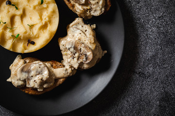 baked potatoes with pork medallions