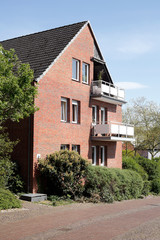 Fototapeta na wymiar Modernes Wohngebäude aus Backstein, Mehrfamilienhaus, , Bremen, Deutschland, Europa