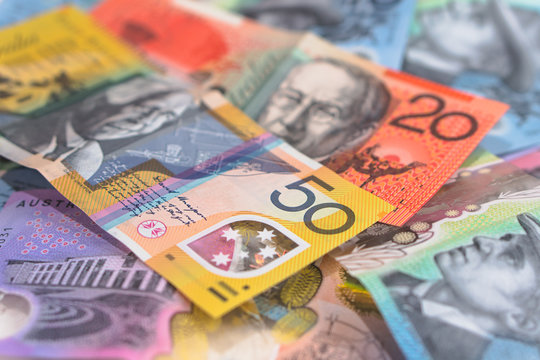 Australian cash notes fanned out making a colourful background