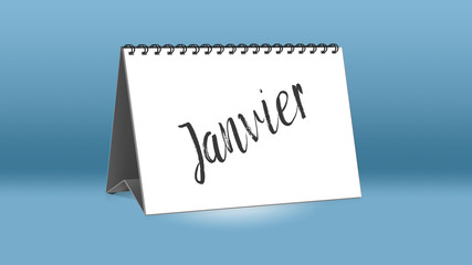 Ein Kalender für den Schreibtisch zeigt den französischen Monat Janvier (Januar in deutscher Sprache)