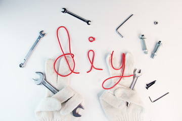 Construction tools DIY background concept. Flat lay composition with different construction tools on white  background.