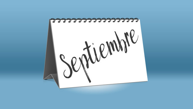 Ein Kalender für den Schreibtisch zeigt den spanischen Monat Septiembre (September in deutscher Sprache)
