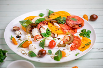 carpese salad with cheese and vegetables