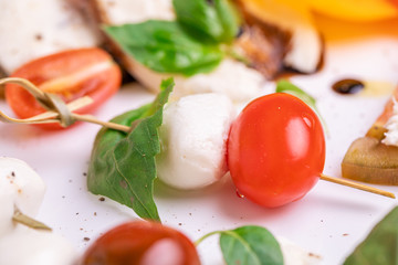 carpese salad with cheese and vegetables