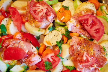 meat with vegetables, herbs and spices