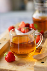 hot black tea with strawberries