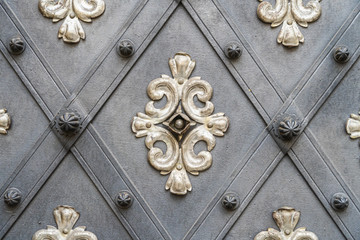 Texture of metal ornament plate as a vintage door decoration