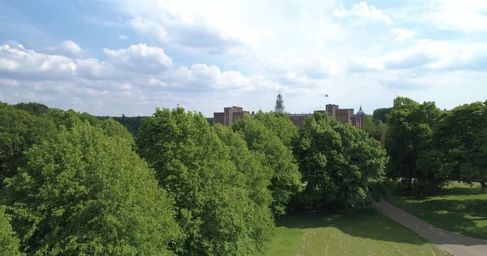 Hatfield House, England revealed over trees