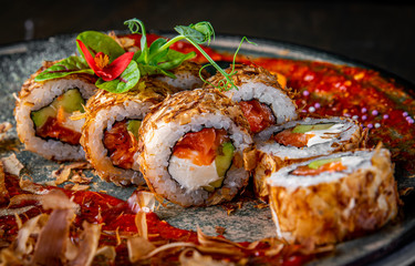 sushi roll with salmon in plate