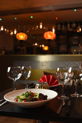 Rack of lambs served on a table