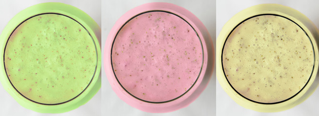 Set of different fresh fruit smoothies in glass