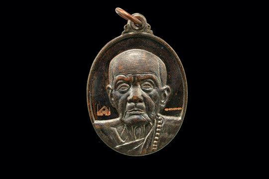 Thai amulet isolet with black background 