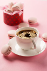 Rose french cookies macaroons on pink background