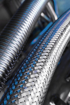 Corrugated metal hose for fuel supply, Close - up.