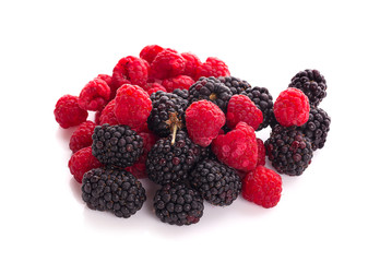 Raspberries and blackberries an isolated on white background