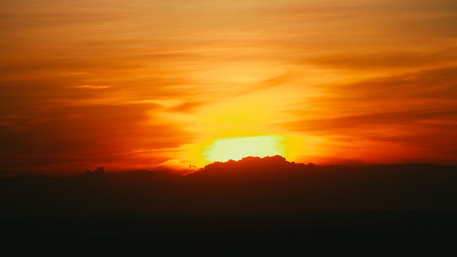 Beautiful sunrise in Kenya, Africa. Fiery orange sky.