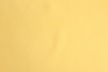 Texture of beautiful yellow fabric as background, closeup