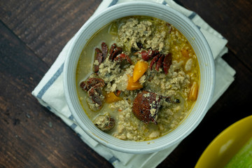 Soy bean paste with mince crab or pork with coconut milk in bowl.