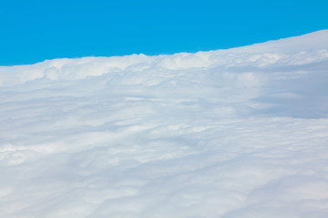 white milky clouds and blue sky