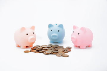 Three piggybank and money on white background. Finance and savings concept.