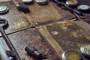 vintage accessories underneath vintage texture books of the last century