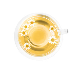 Delicious chamomile tea in glass cup isolated on white, top view