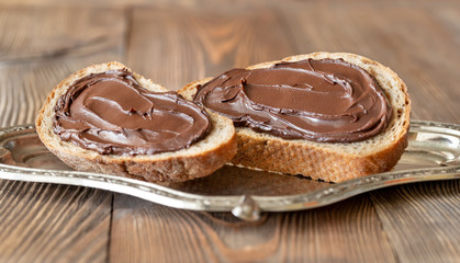 Slices of bread with chocolate paste