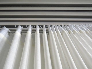 Silver aluminum curtain rail. White curtain background. Ivory chiffon curtains. White curtain sheet...