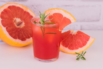 A glass of grapefruit juice. Close-up.