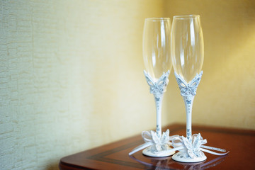 wedding glasses with white butterfly decoration