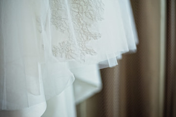 details of the wedding dress. lace white wedding dress close-up