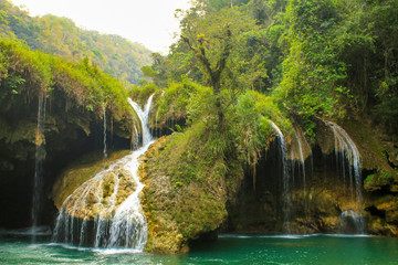 Waterfall in Semuc champey natural pool from the riverside