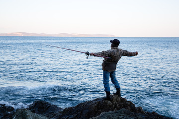 Fisherman admires the open spaces