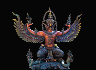 Garuda statue on black background.