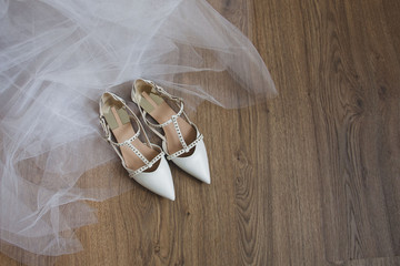white wedding shoes with veil