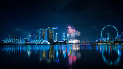 singapore skyline at night with fireworks
