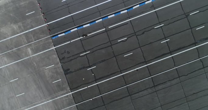 Large flat asphalt area, disused English runway converted for automotive testing