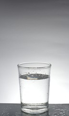 A glass of water with water inside