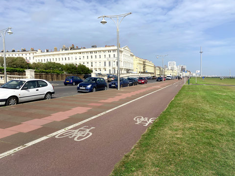 Empty cycle path next to cars