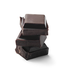 Pieces of delicious dark chocolate isolated on white