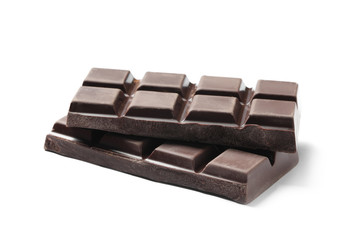 Pieces of delicious dark chocolate isolated on white