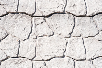 The texture of the stone wall. The wall of a large old house.
