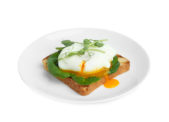 Delicious poached egg sandwich isolated on white