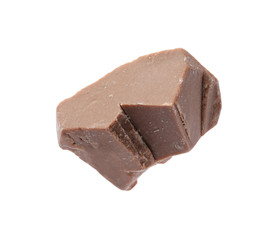 Piece of delicious milk chocolate isolated on white