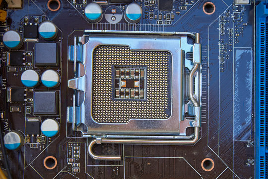 CPU socket on the motherboard,close up of motherboard with empty socket under processor