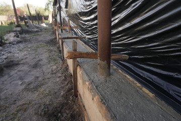 formwork and concrete for the fence